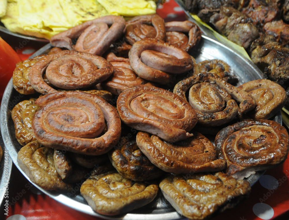 Sausage on a tray during the New Year's fair in Kiev, January 4, 2019. Sausage on a tray during the New Year's fair in Kiev, January 4, 2019.