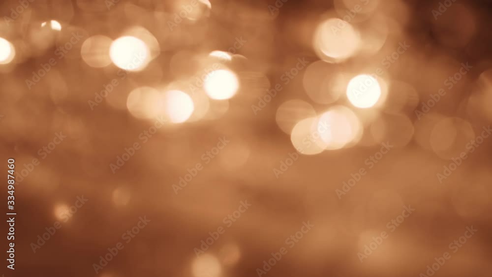 Golden lights, glowing abstract background. 4K resolution Golden lights, glowing abstract background. 4K resolution