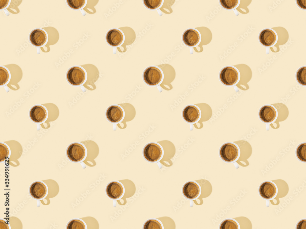 top view of cups of fresh coffee on beige, seamless background pattern top view of cups of fresh coffee on beige, seamless background pattern