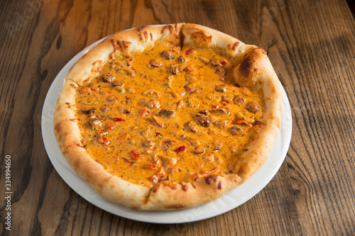 Pizza with cheese and beefs...