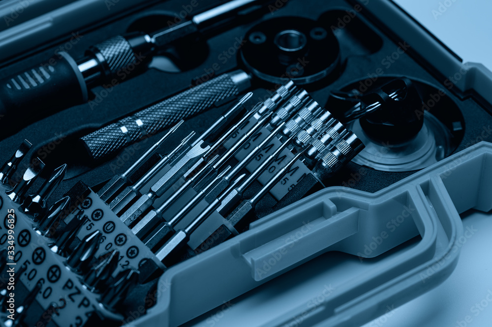 . A set of professional tools in a case for repairing phones, smartphones, computers and other office equipment. . A set of professional tools in a case for repairing phones, smartphones, computers and other office equipment.
