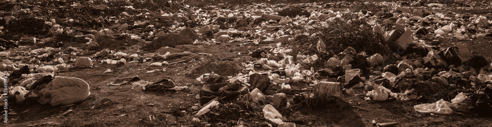 Domestic garbage in landfill. A pile of plastic trash on dump. Stop plastic pollution to save environment and ecology of the earth. Say no to plastic bag. Domestic garbage in landfill. A pile of plastic trash on dump. Stop plastic pollution to save environment and ecology of the earth. Say no to plastic bag.