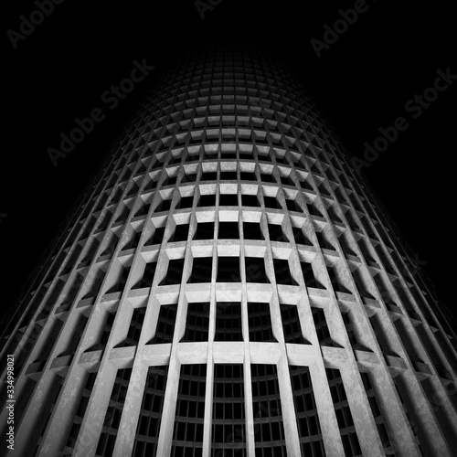 design element. 3d illustration. rendering. abandoned conrete skyscraper in darkness black and white
