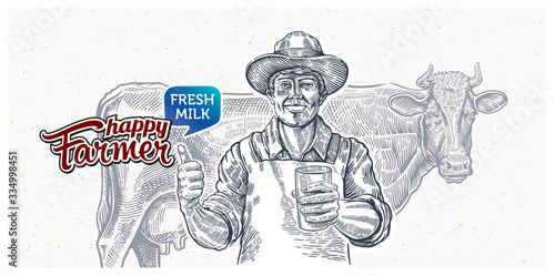 A happy farmer with a glass of milk in his hand and a cow standing behind him in the background.