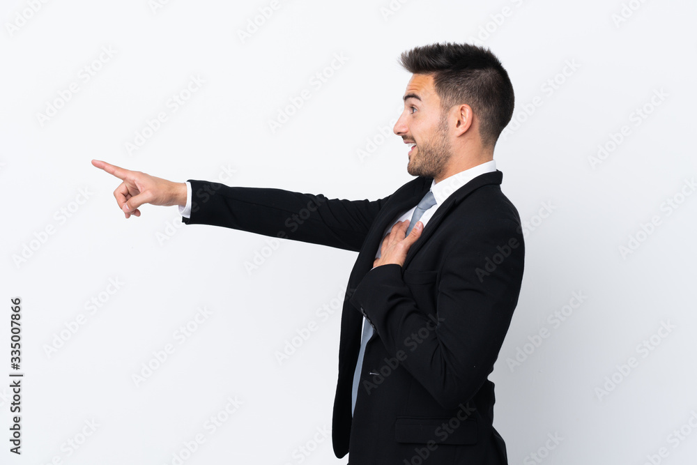 Young business man over isolated background pointing finger to the side Young business man over isolated background pointing finger to the side