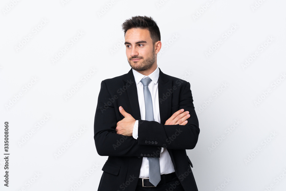 Young business man over isolated background thinking an idea Young business man over isolated background thinking an idea