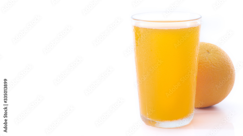 glass of orange juice and orange pieces glass of orange juice and orange pieces