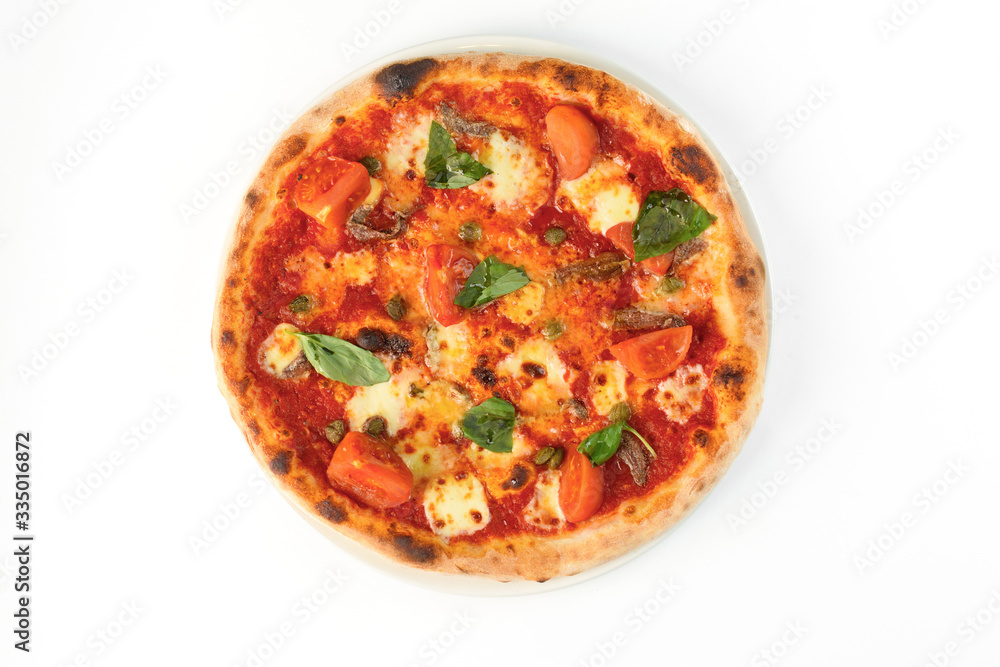 Pizza with tomatoes, cheese and basil on white isolated background Pizza with tomatoes, cheese and basil on white isolated background