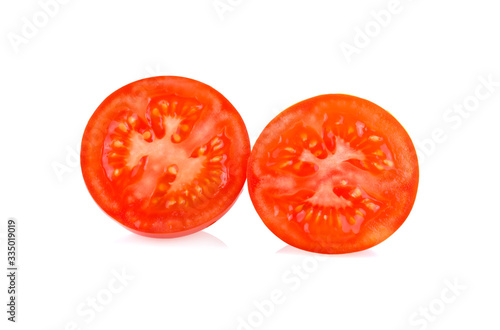 Tomato slice isolated on white.