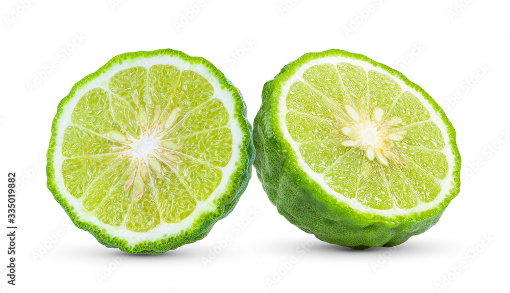 half of bergamot or kaffir with seeds on white background half of bergamot or kaffir with seeds on white background