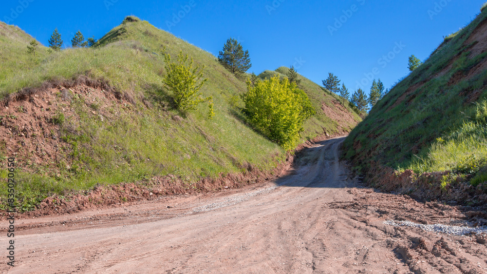 dirt road going up the ravine dirt road going up the ravine