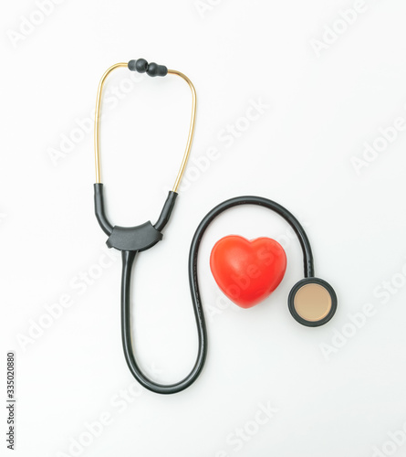 stethoscope with heart symbol on white background. on top