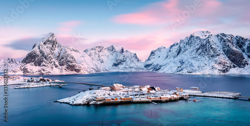 Panoramic view to Sakrisøya Island with mountains on background at sunrise - Lofoten Islands, Norway