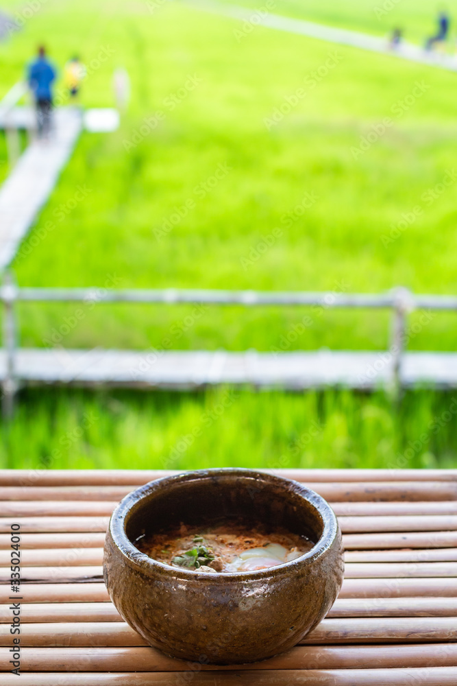 Naklejka premium Thai style spicy soup and noodle
