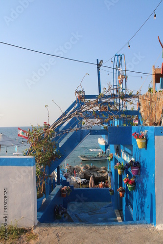 Blue house by the sea on the coast of Lebanon