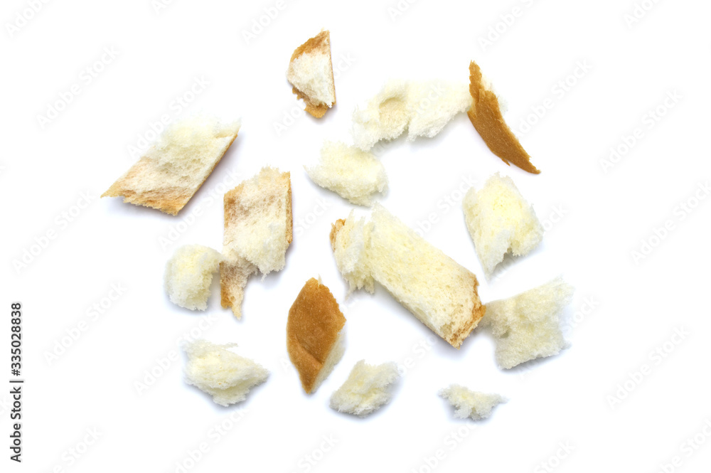 Slice of fresh bread and crumbs isolated on white background. Slice of fresh bread and crumbs isolated on white background.
