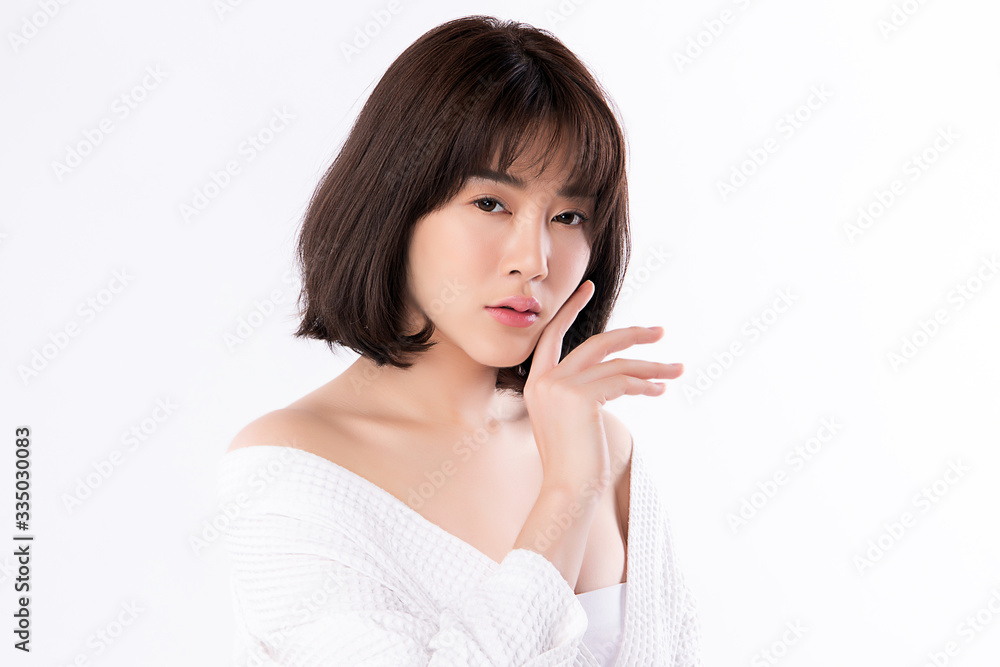 Beautiful Young Asian Woman with Clean Fresh Skin. Face care, Facial treatment, Cosmetology, beauty and healthy skin and cosmetic concept, woman beauty skin isolated on white background Beautiful Young Asian Woman with Clean Fresh Skin. Face care, Facial treatment, Cosmetology, beauty and healthy skin and cosmetic concept, woman beauty skin isolated on white background