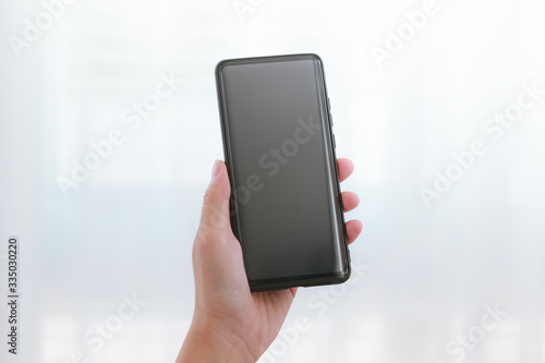 woman hands holding smartphone