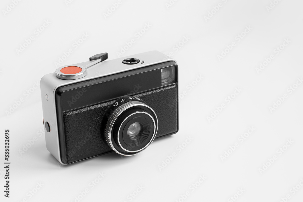 Old camera in bright background, isolated Old camera in bright background, isolated