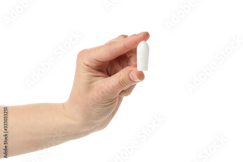 Hand with anal or vaginal candle, isolated on white background