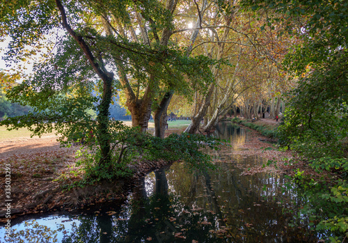 The park beside the Alzon River in Uzès, France is a popular escape in the fall.
