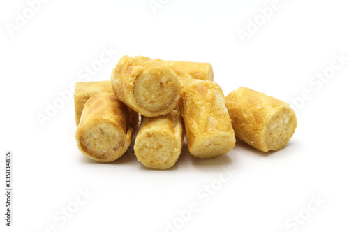 Pile of Biscuit roll filling with cream flavour isolated on white background.