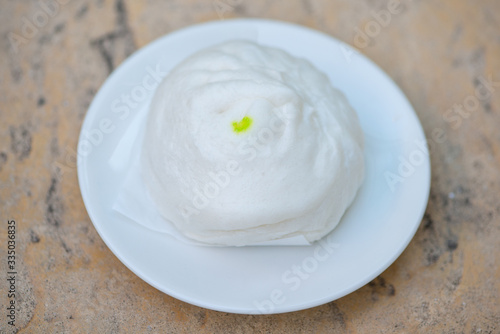 White steamed bun on white dish