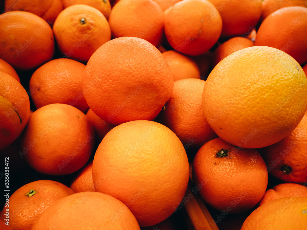Many ripe oranges photographed in a supermarket. Many ripe oranges photographed in a supermarket.