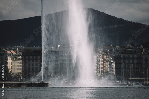 Geneva fountain close-up with dramatic weather.