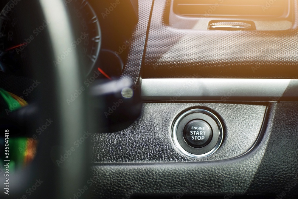 Engine start/stop button on car. Engine start/stop button on car.