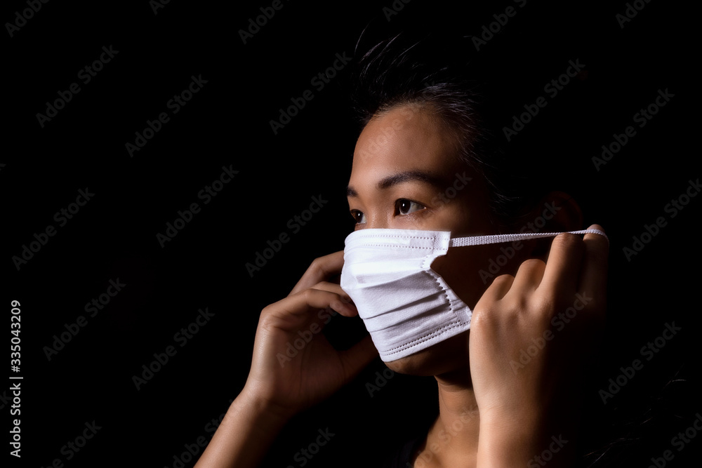 Asia woman Mask protection covid19 or coronavirus. People holding hand mask for use Prevent disease covid-19. Asia woman Mask protection covid19 or coronavirus. People holding hand mask for use Prevent disease covid-19.