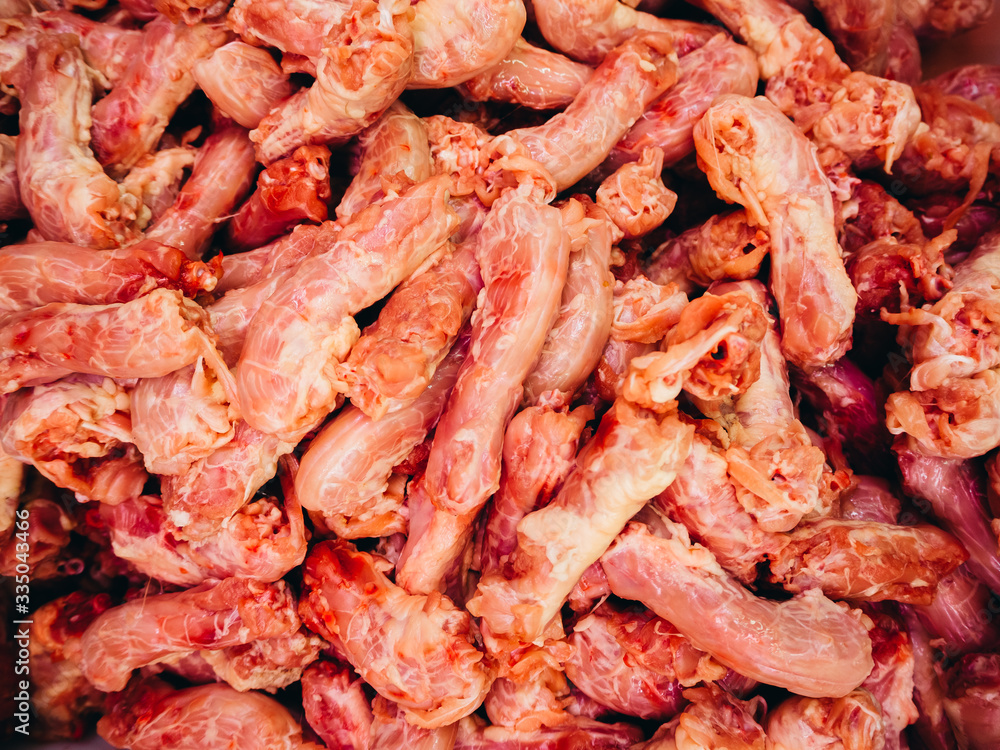 Texture of chicken necks shot from above.