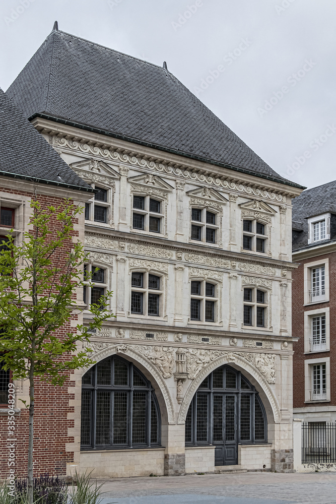 Naklejka premium White stone Sagittarius House (Maison du Sagittaire) from and of XVI century at Jules Bocquet square in Amiens. Picardy, Somme, France.