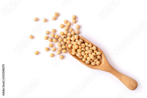 Fototapet Closeup soy beans in wooden spoon isolated on white background with clipping path
