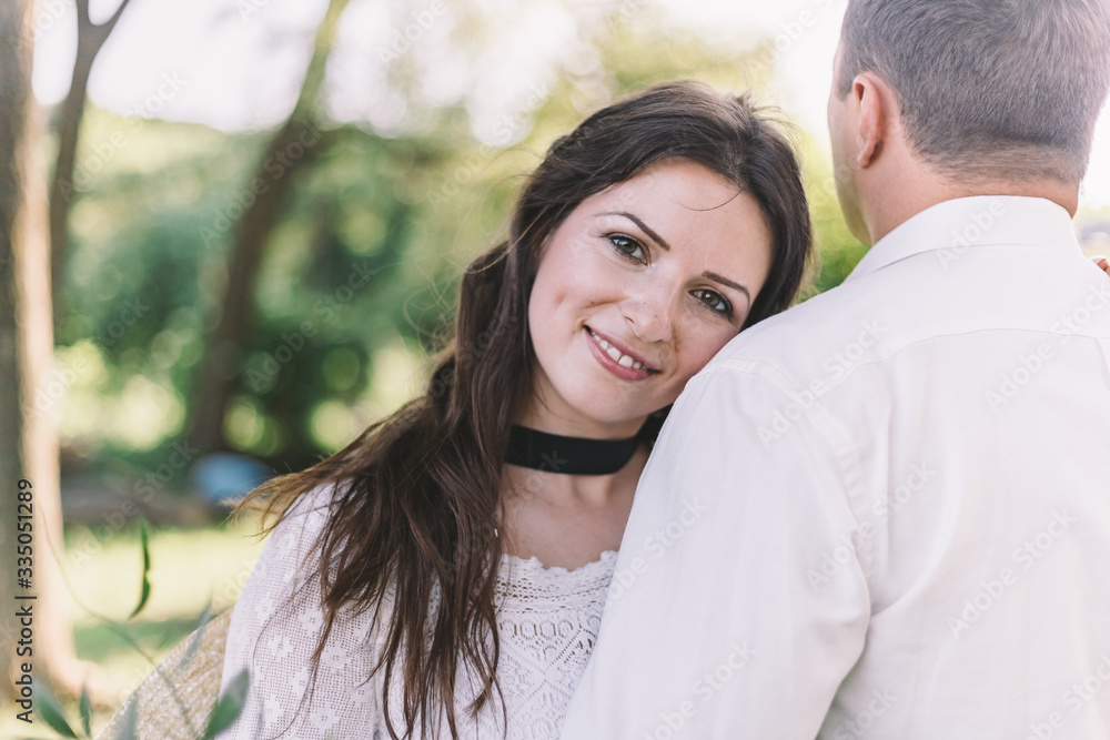 The stylish young bride and groom are expressing their affectionate love to each other The stylish young bride and groom are expressing their affectionate love to each other
