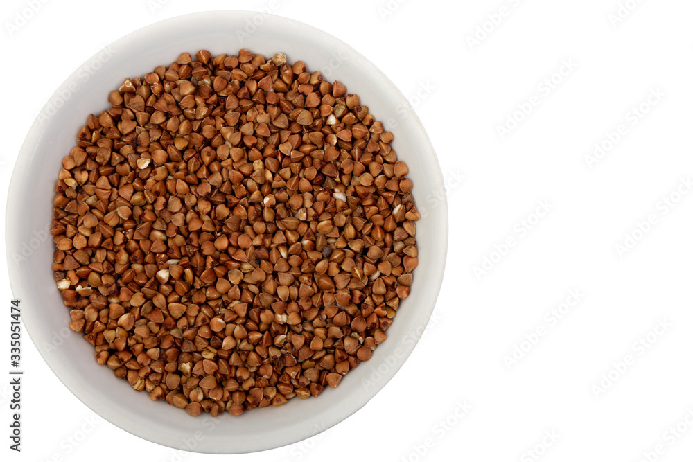 buckwheat in a white plate on a white background buckwheat in a white plate on a white background