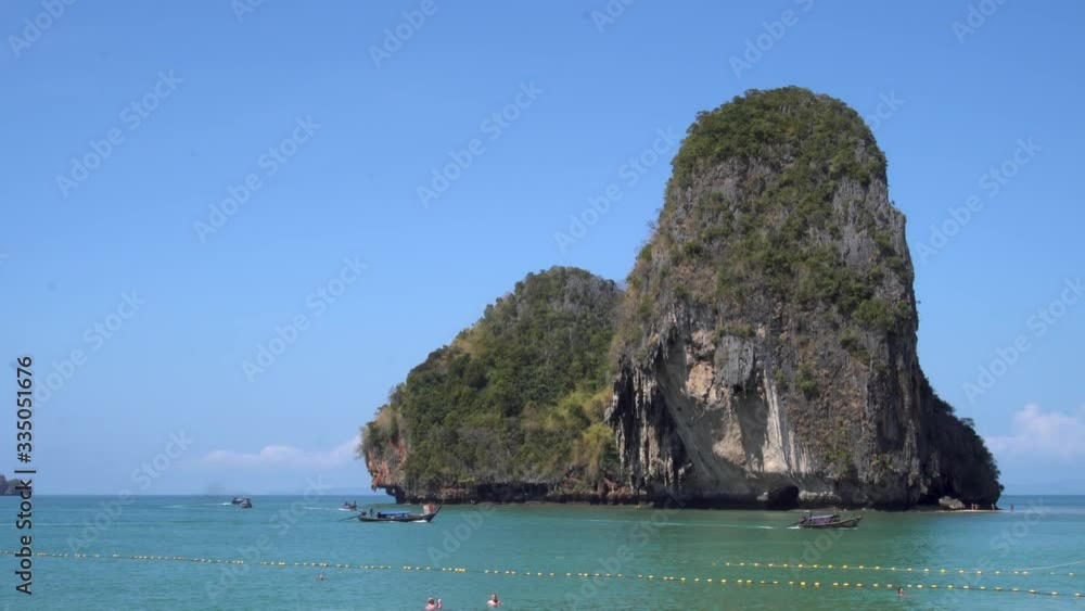 Thai traditional wooden longtail boat and beautiful sand beach at Koh Poda island in Krabi province. Ao Nang, Thailand ,Krabi island is a most popular tourist destination in Thailand Thai traditional wooden longtail boat and beautiful sand beach at Koh Poda island in Krabi province. Ao Nang, Thailand ,Krabi island is a most popular tourist destination in Thailand