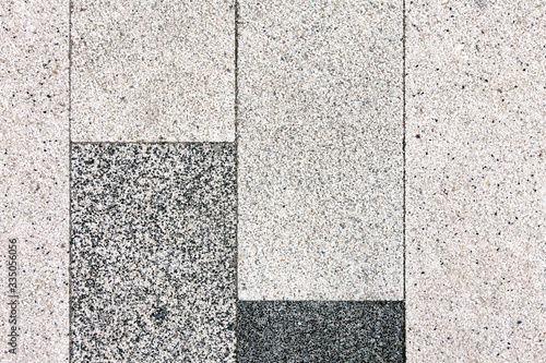The texture of the sidewalk stone pavers for concrete from stone chips.