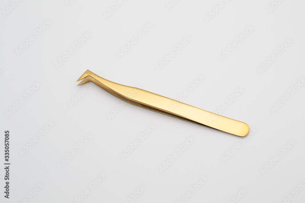 Obraz premium tweezers eyelash golden volume gold curved 5d 