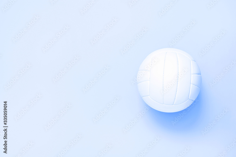 White volleyball leather ball.Top view. Blue filter