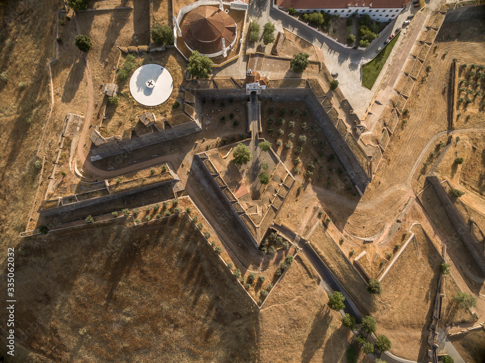 Aerial top down you of geometric shaped fortress elements of Elvas including a ravelin and counterscarp