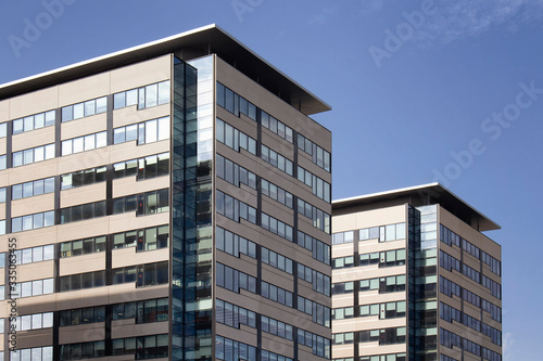 Photography View of modern office buildings with clear blue sky background in Barcelona
