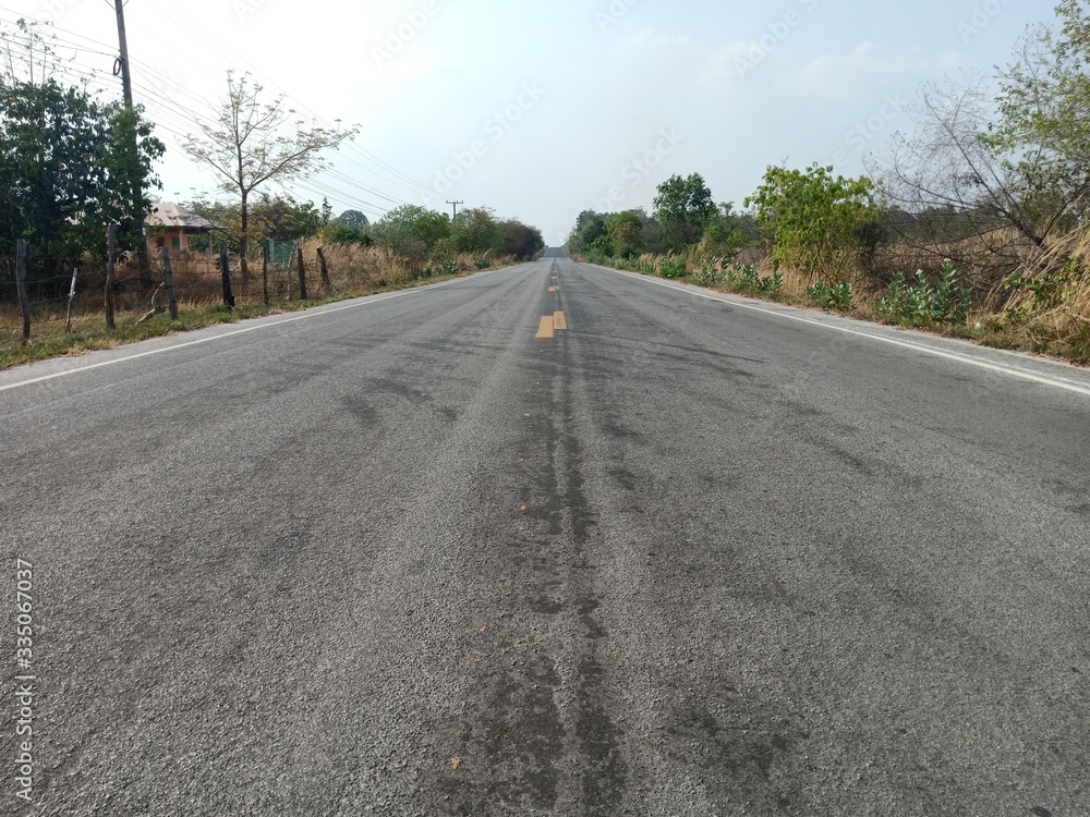 Asphalt roads in Thailand and yellow traffic lines