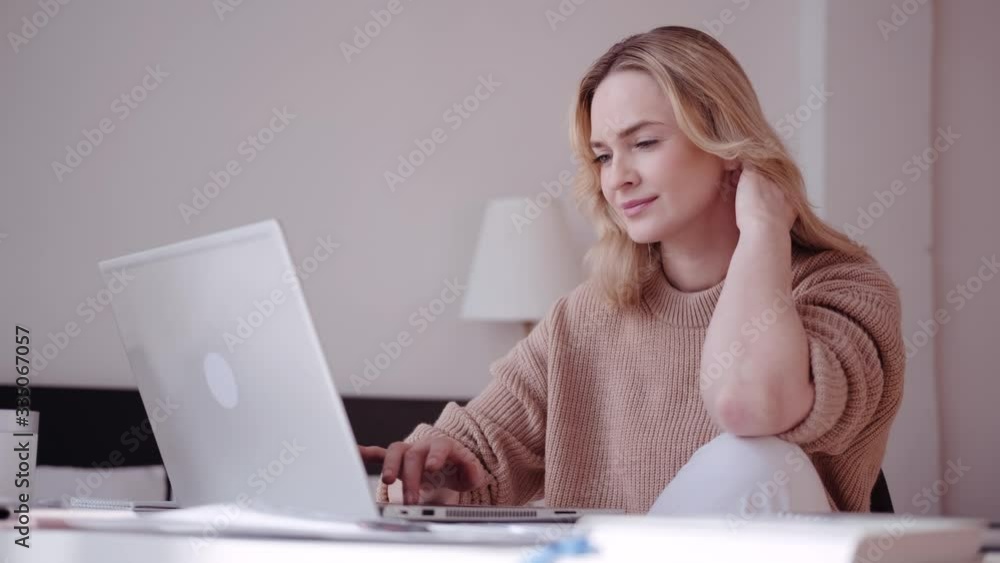 Calm woman with laptop at home, portrait. Lifestyle of a modern woman Calm woman with laptop at home, portrait. Lifestyle of a modern woman