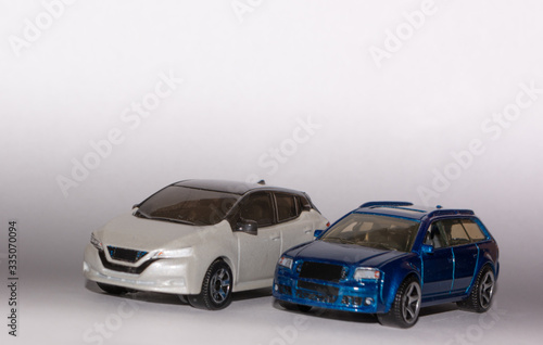 model toy cars white and blue racing white background from right