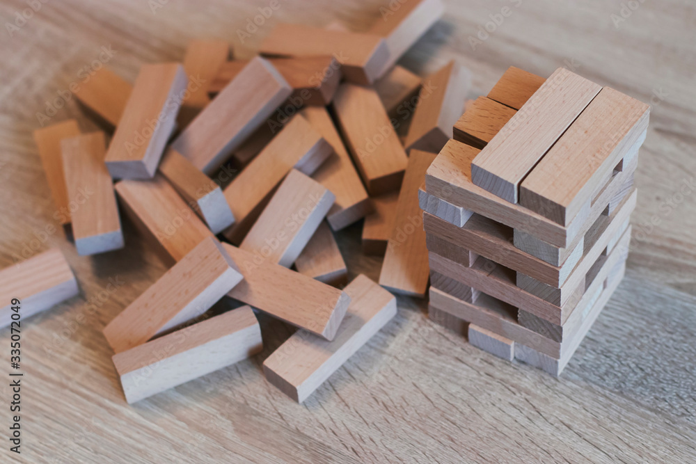 The tower in Jang's game is destroyed on the table. Competition who will win. Spending time at home. The tower in Jang's game is destroyed on the table. Competition who will win. Spending time at home.