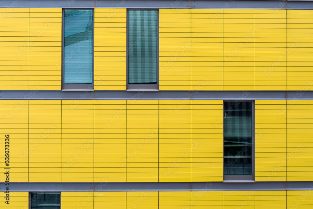 Fototapeta premium Closeup of modern yellow facade