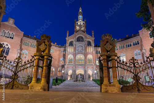 Photography Classic building illuminated at night in Barcelona