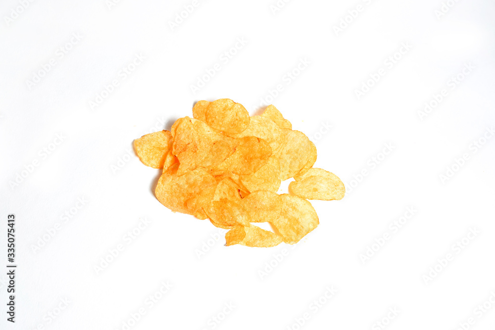 Fried potatoes chips on white background Fried potatoes chips on white background