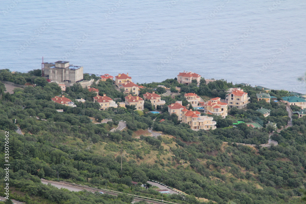 coastal sea houses on the background of the sea